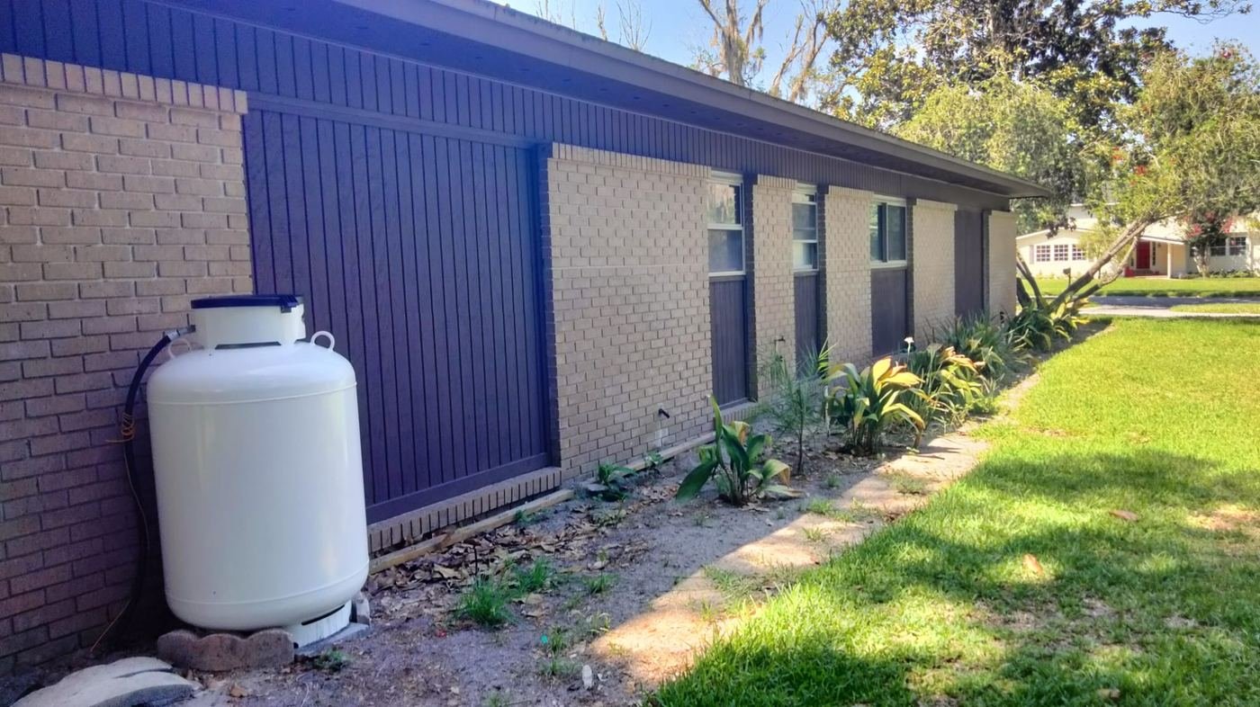 Board-and-batten siding painted deep navy