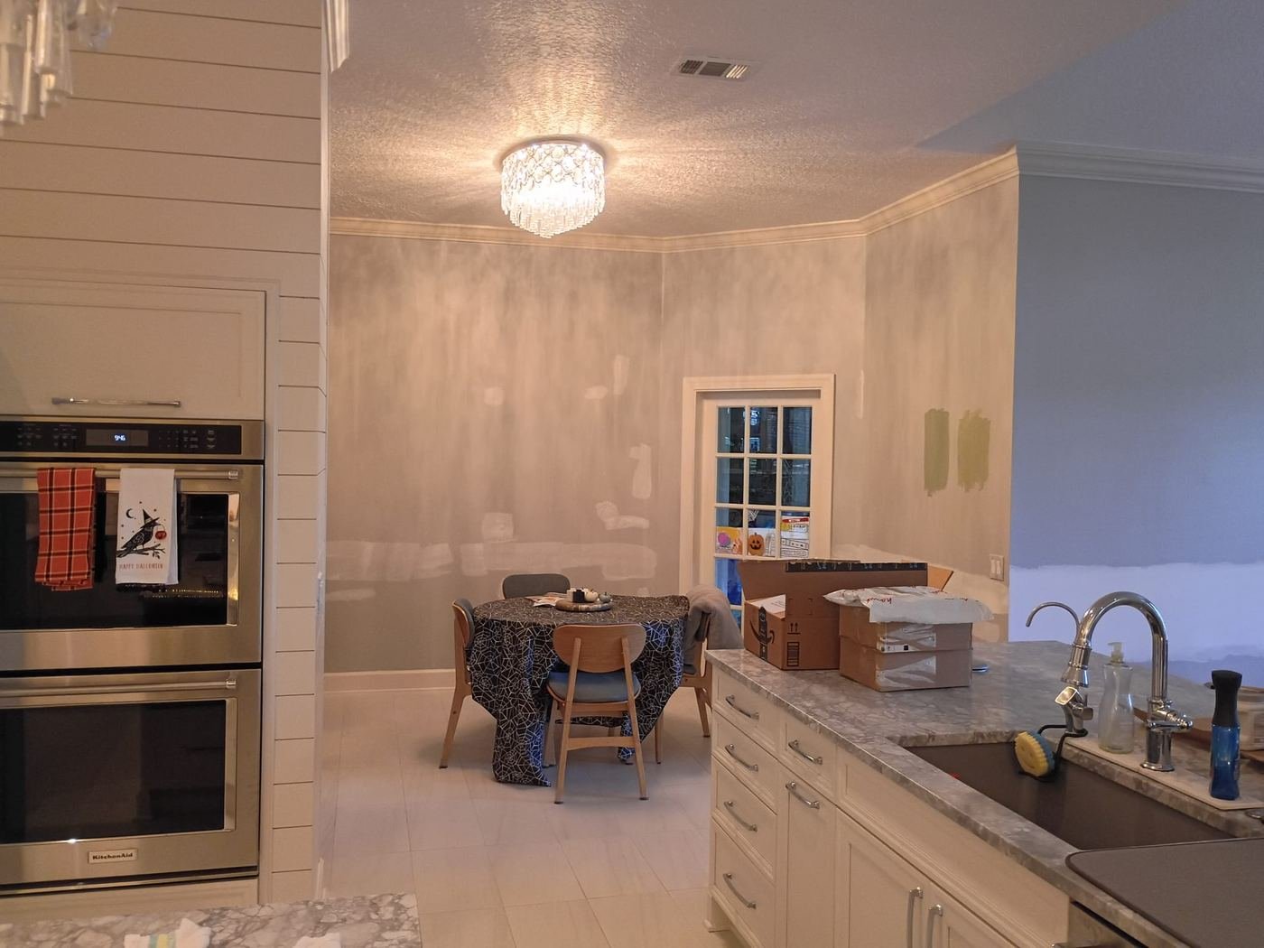 Kitchen and breakfast area mid-repaint