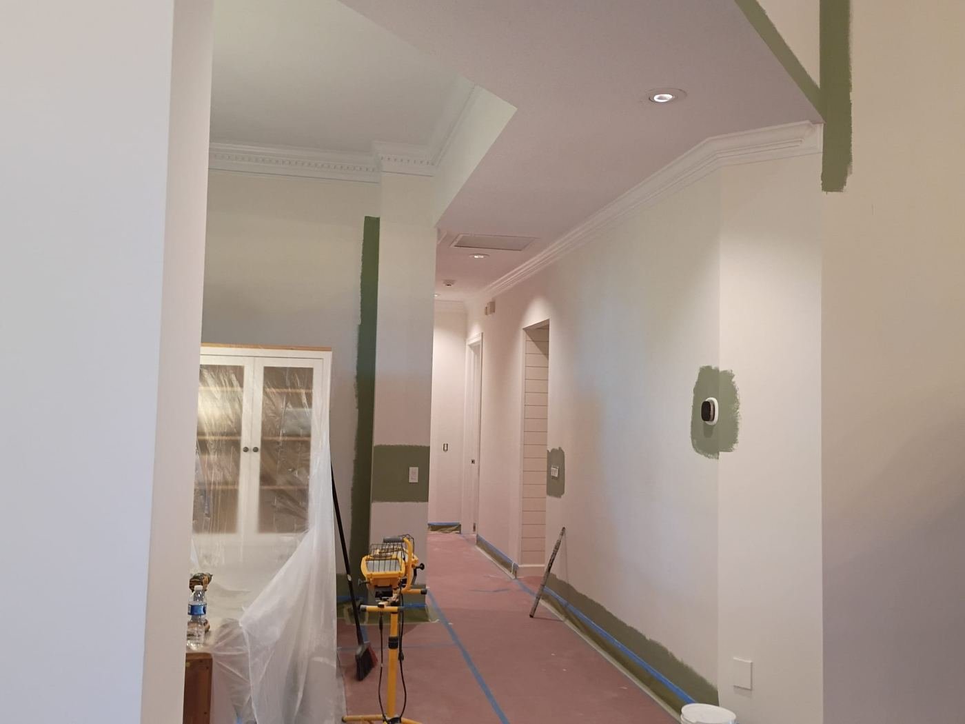 Hallway masked and protected before painting
