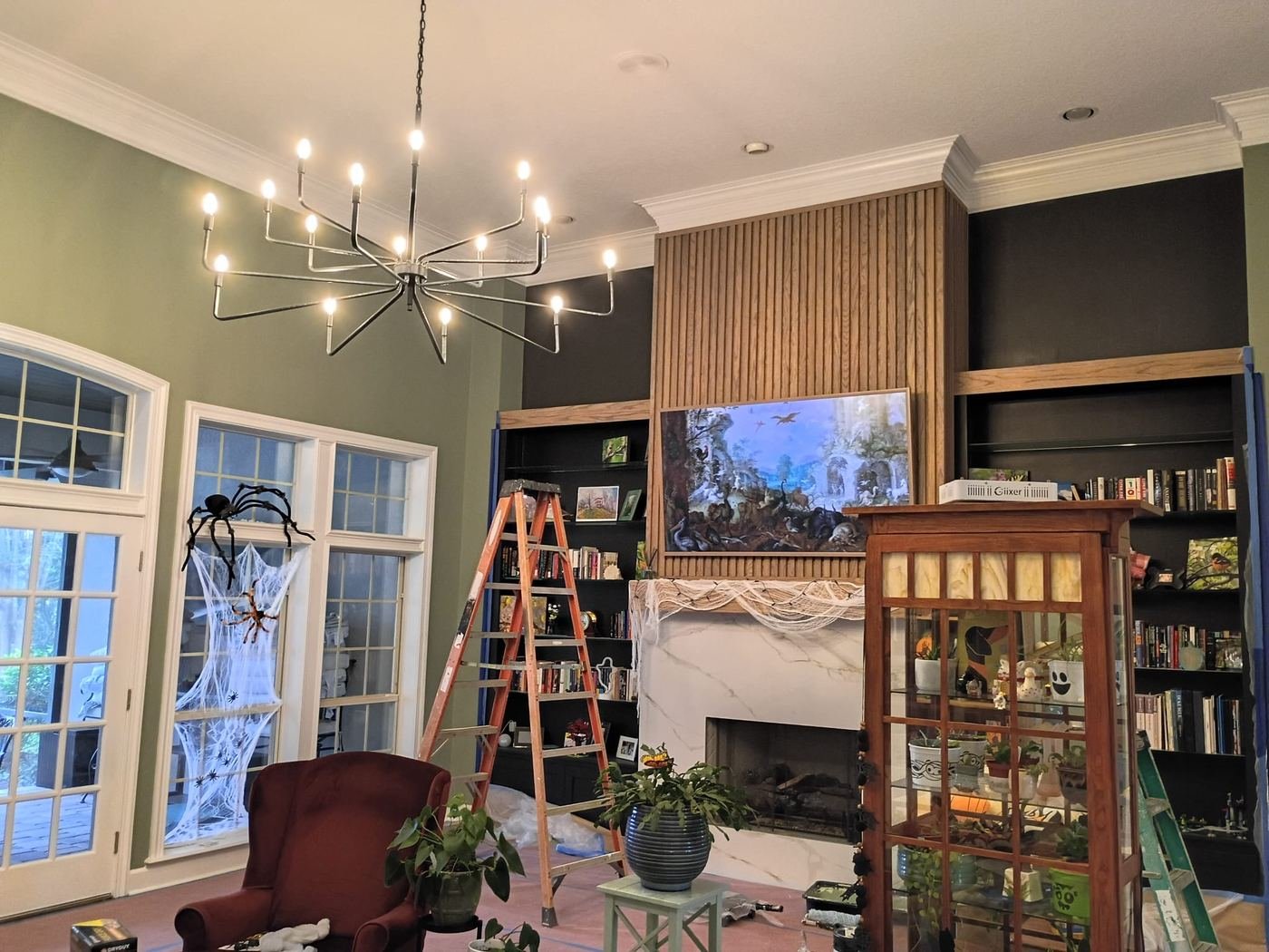 Green living room with a wood slat accent wall