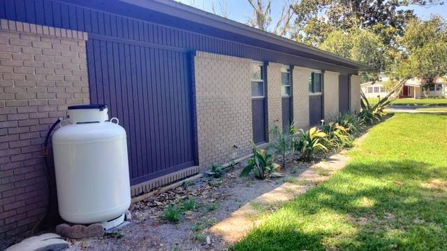 Board-and-batten siding painted deep navy